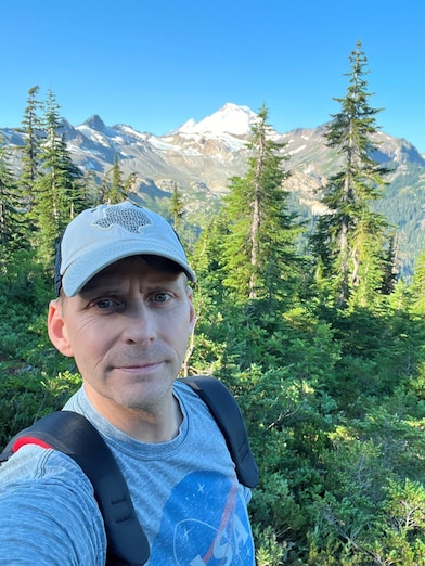 Selfie of a man on a hike trail