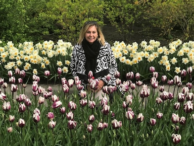 woman posing in a tulip field