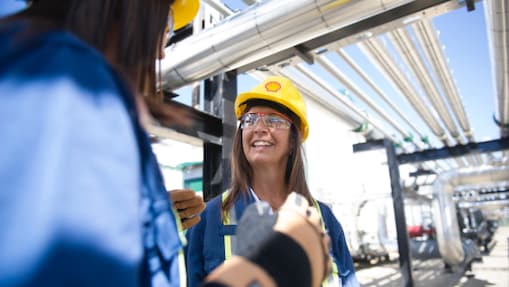 female engineer smiling at an operational site