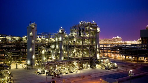 A Shell refinery at night.