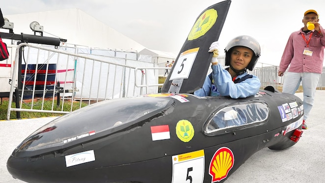 The SI PITUNG, #5, a gasoline prototype vehicle from Batavia Generation Team at the Universitas Negeri Jakarta in Jakarta Timur, Indonesia, gets set to enter the track during day two of the Shell Eco-marathon Asia, in Manila, Philippines, Friday, March 4, 2016.
