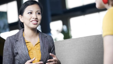 An HR representative talking to an employee