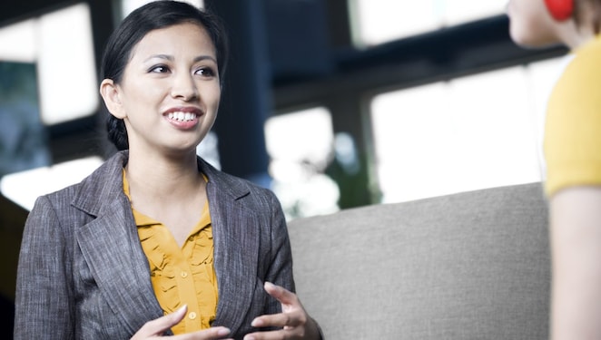 An HR representative talking to an employee