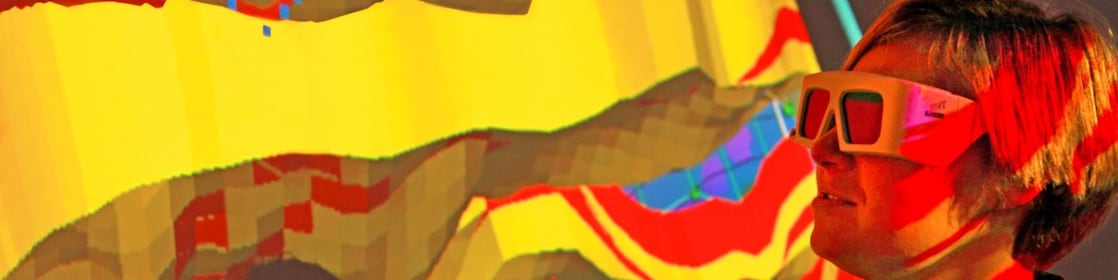 lady wtaching screen with 3d glasses