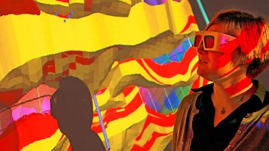 lady wtaching screen with 3d glasses