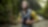 young man hiking through the Redwood forest.