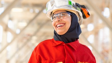 Lady in red dress at work place