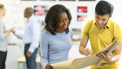 two designers discussing