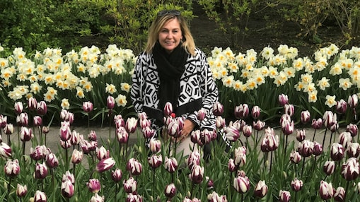 woman posing in a tulip field