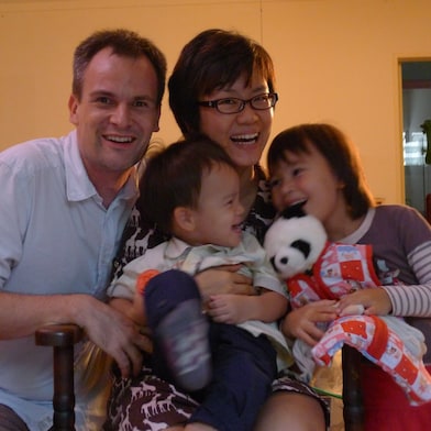Shell employee Joyce Loh with her husband and two kids.