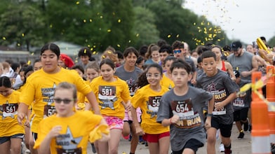 Group of students running in the fun run