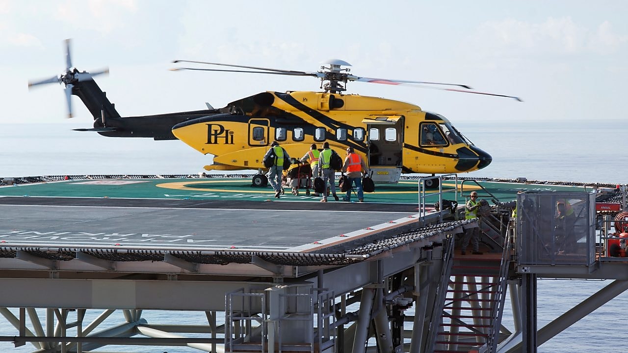 Helicopter taking off during cargo load