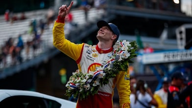 Newgarden celebrates after winning the 107th Indy 500
