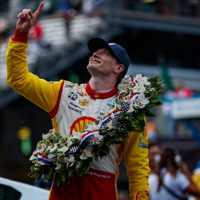 Newgarden celebrates after winning the 107th Indy 500