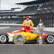 Newgarden with the winner's wreath and Borg-Warner Trophy.