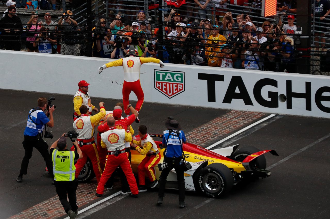 Newgarden makes his way to fans to celebrate his big win.