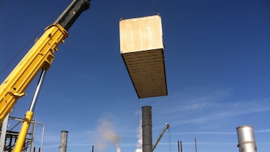crane lifting a large module