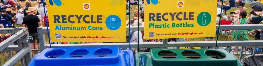 Two recycling bins at Jazz Fest