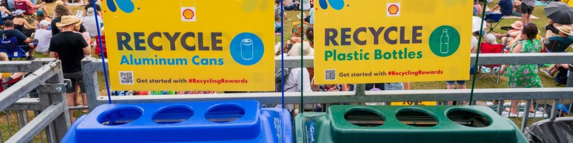 Two recycling bins at Jazz Fest