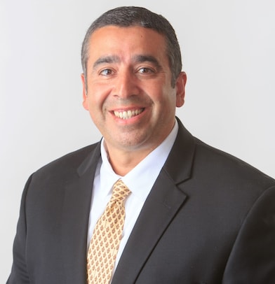 A headshot of Hector Laines