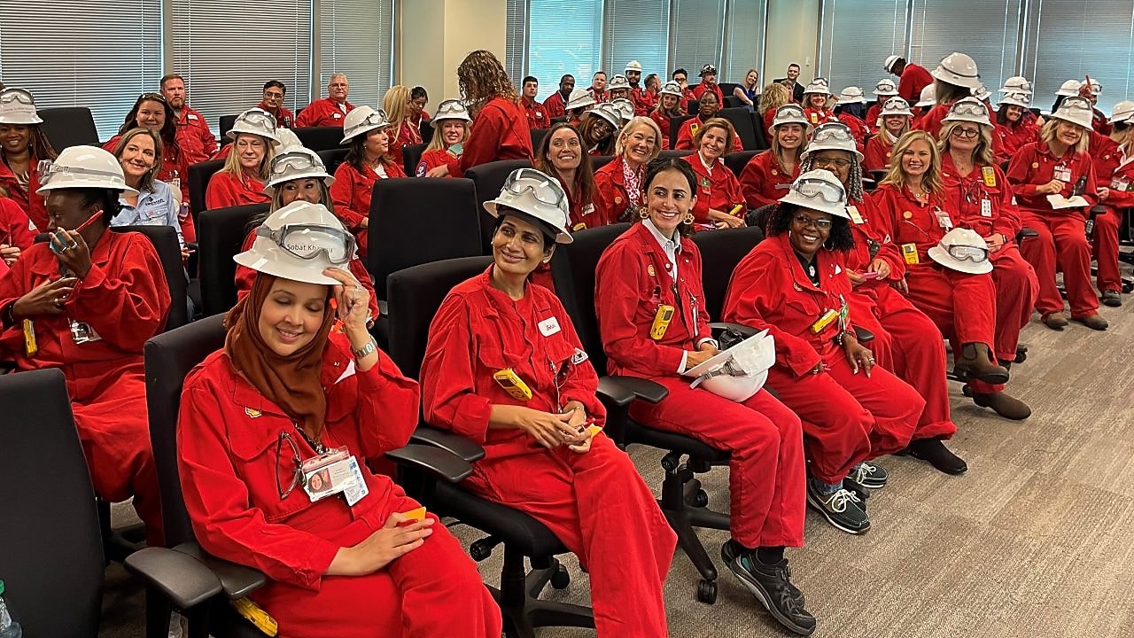 Room of Women Business Owners wearing Shell red PPE