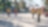 people in yellow shirts raking sand in a playground