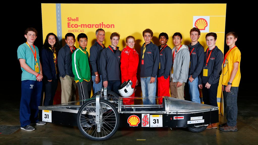 group of students behind Eco-marathon car
