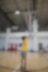 youth shooting a basketball