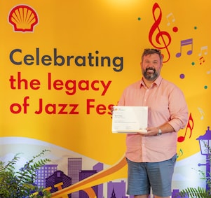 Man holding certificate