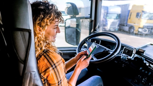 woman driver sitting inside truck