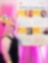 women standing next to poster