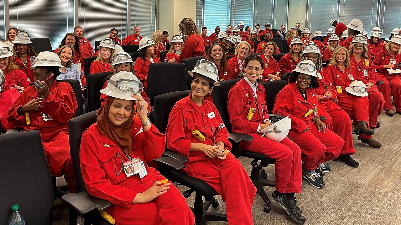 Room of Women Business Owners wearing Shell red PPE