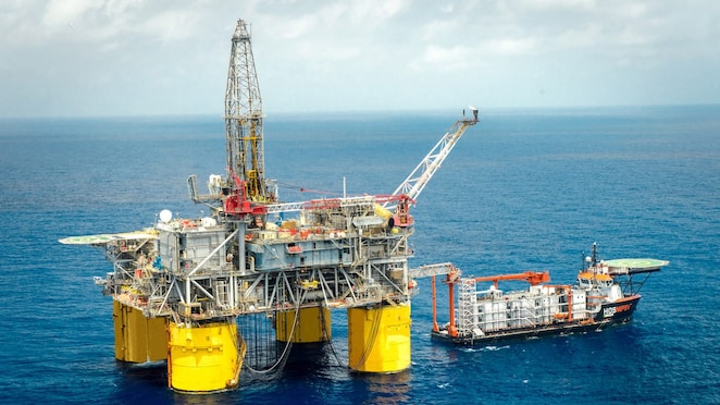 wide-shot of flotel positioned next to Shell deep-water asset