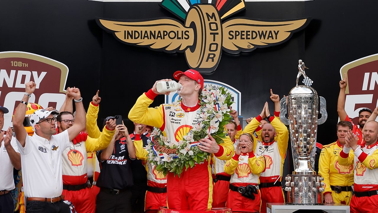 Newgarden celebrating back to back Indy 500 win
