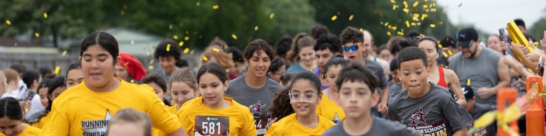 Group of students running in the fun run