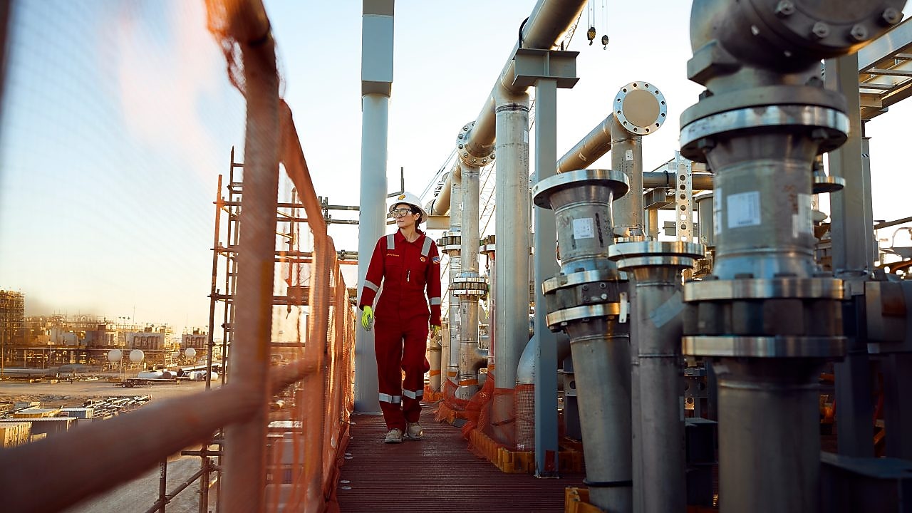 Woman walking bridge on a construction site