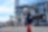 Man in front of manufacturing complex