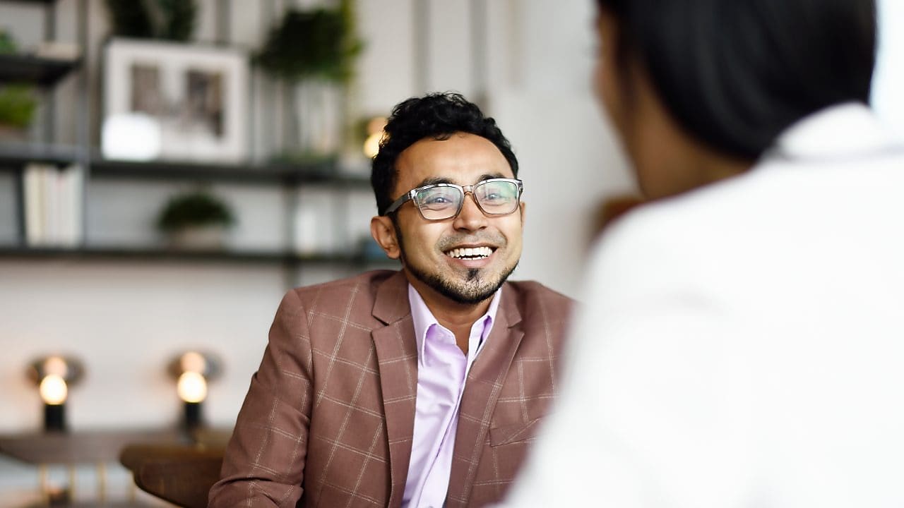 Two colleagues in discussion