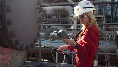 A woman checking the instrument