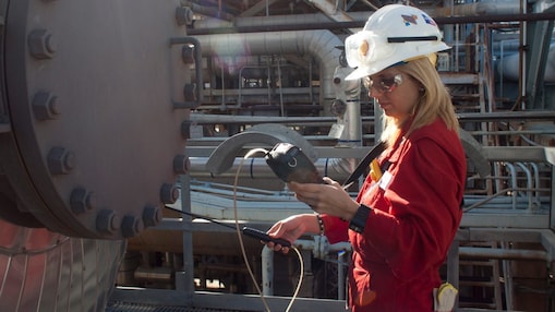 A woman checking the instrument