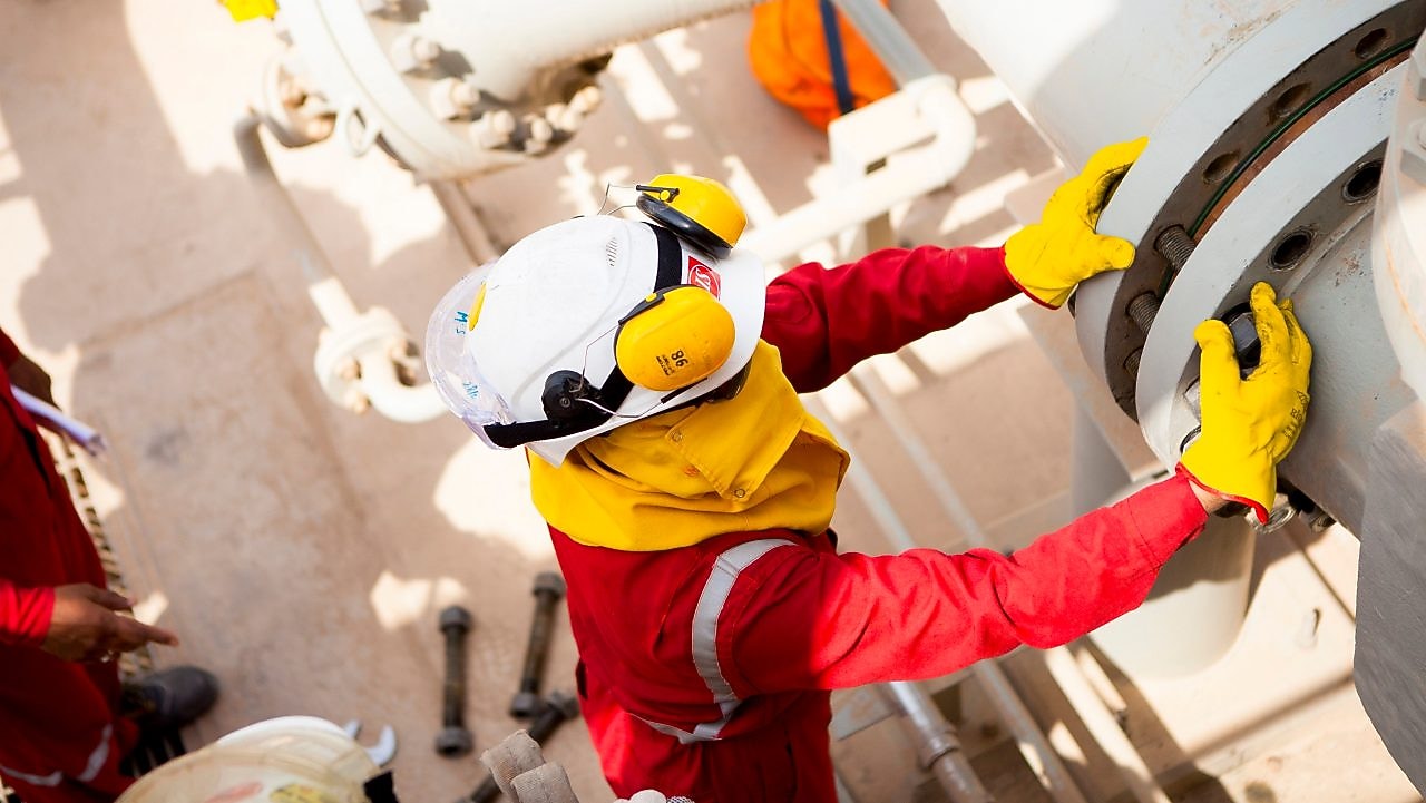worker wearing safety mask and gloves