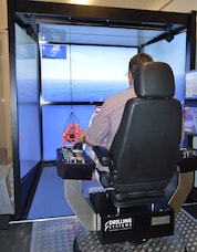 A man in a simulator at Robert Training Center