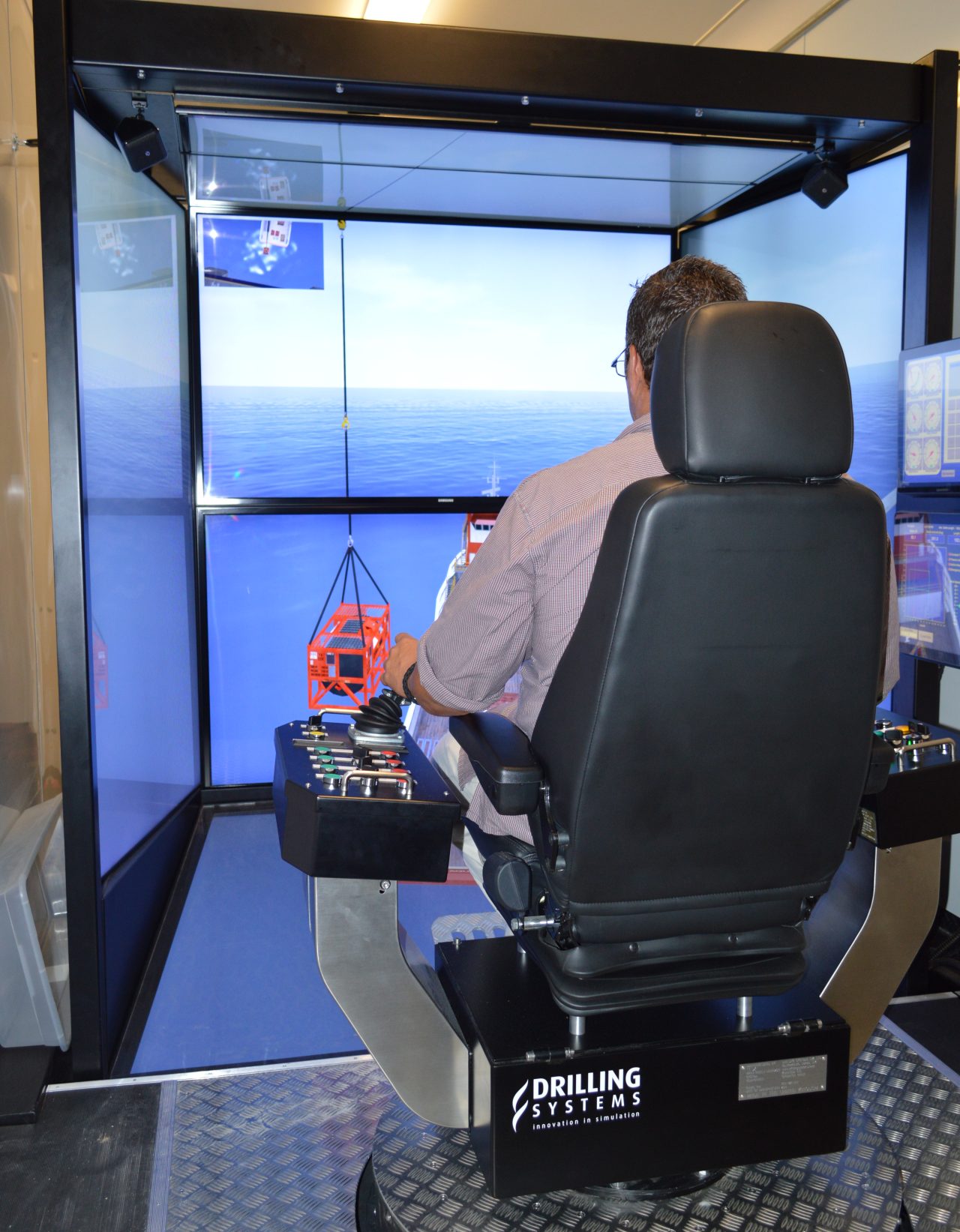 A man in a simulator at Robert Training Center