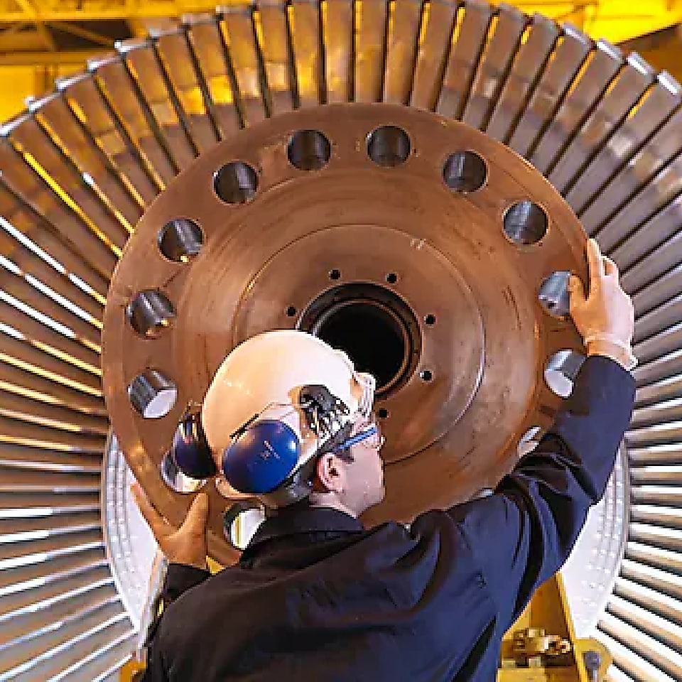 Engineer working on a turbine