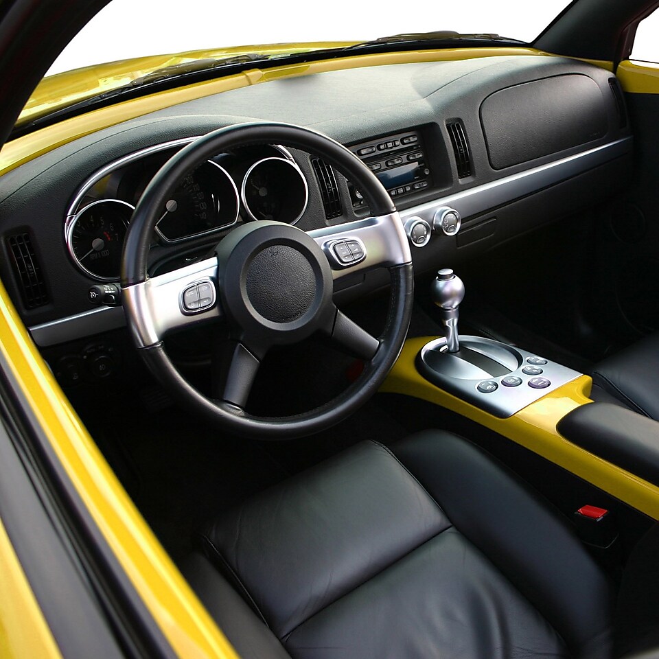 Interior of a Chevrolet SSR, showing dashboard, sat, and steering wheel