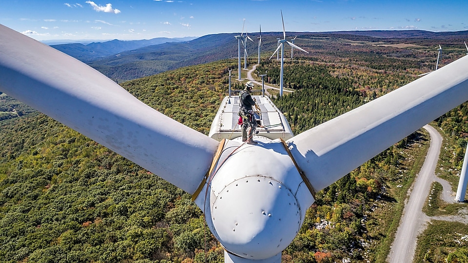 A maintenance crew member working at height at Mount Storm Wind Turbine.