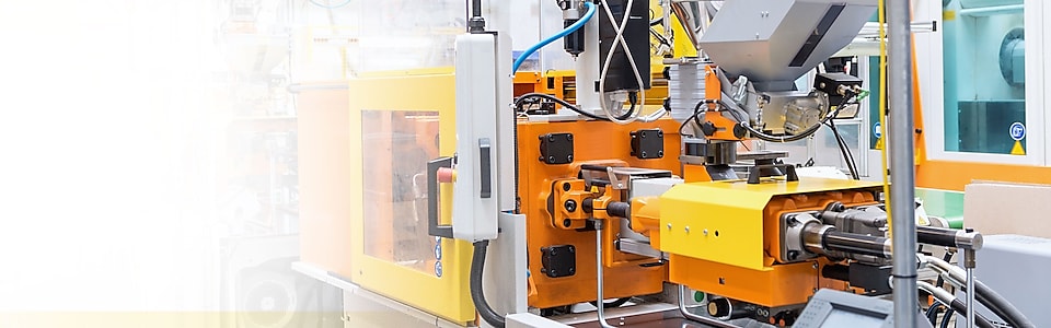 Close-up of injection molding machinery