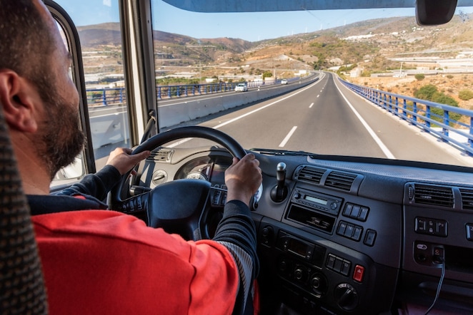 A man driving a truck