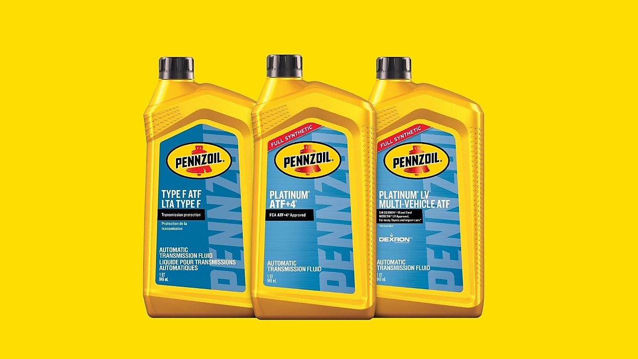 Lineup of three different bottles of Shell Pennzoil automatic transmission fluid.