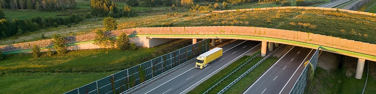 truck driving down highway
